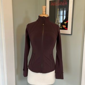Lulu Lemon warm-up jacket in chocolate brown.